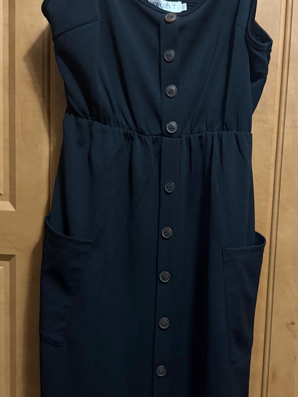 Sleeveless Black Button-Front Dress with Pockets
